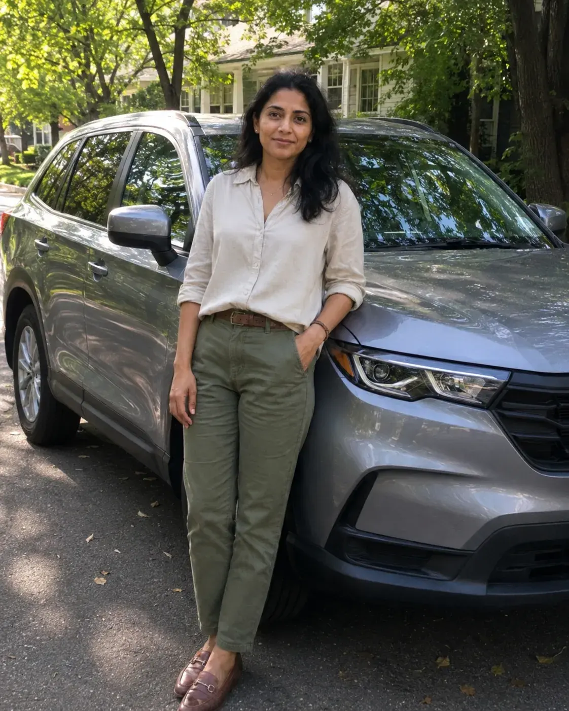 Aisha Patel, who saved $1,760 on a 2025 Honda CR-V Hybrid